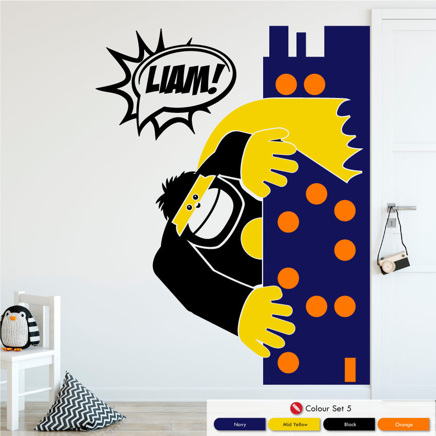 Gorilla leaning out from a skyline tower in navy, mid yellow, black and orange